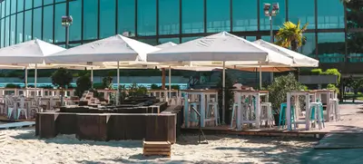 Foto von Sandburg - Strand Küsst Bar