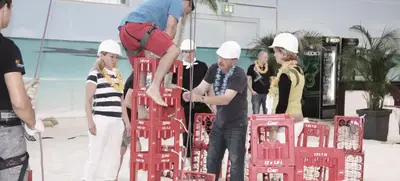 Foto von Teambuilding unter Palmen