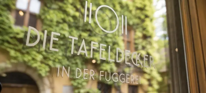 Foto 2 von Die Tafeldecker in der Fuggerei